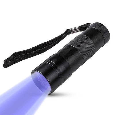 Multifunctional purple light flashlight